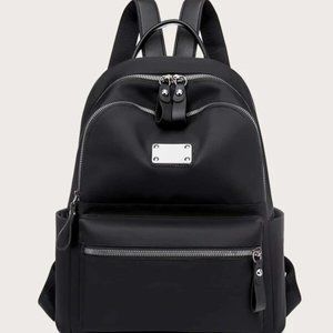Metal Decor Zip Front Backpack